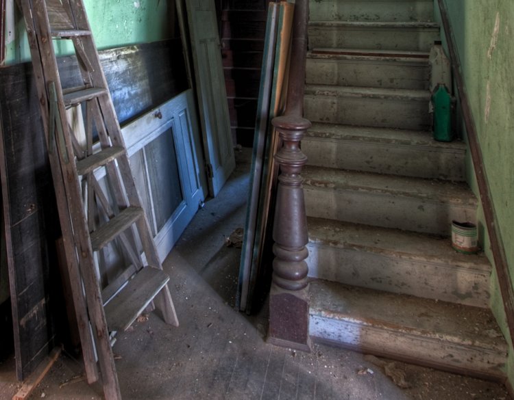 This stripped back original Victorian interior shows that Stair Rods were once used to hold a stair runner carpet in place.